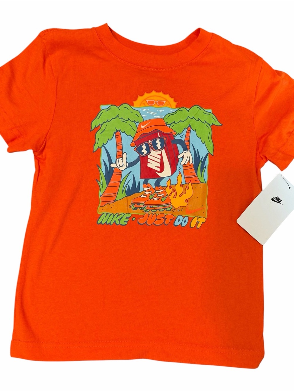 Nike Bright Orange Kids' Short Sleeve Graphic Tee with Tropical Skate Design